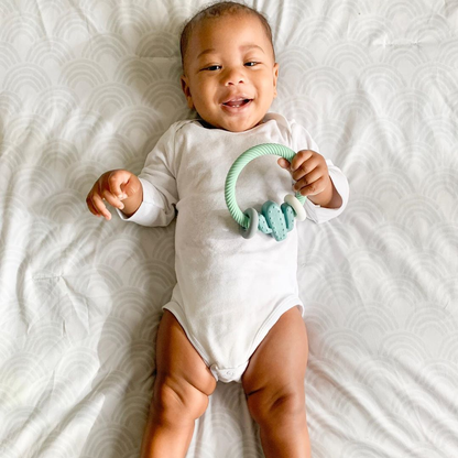 Ritzy Rattle™ Silicone Teether Rattles: Highland Cow